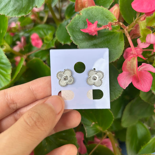 silver color earrings
